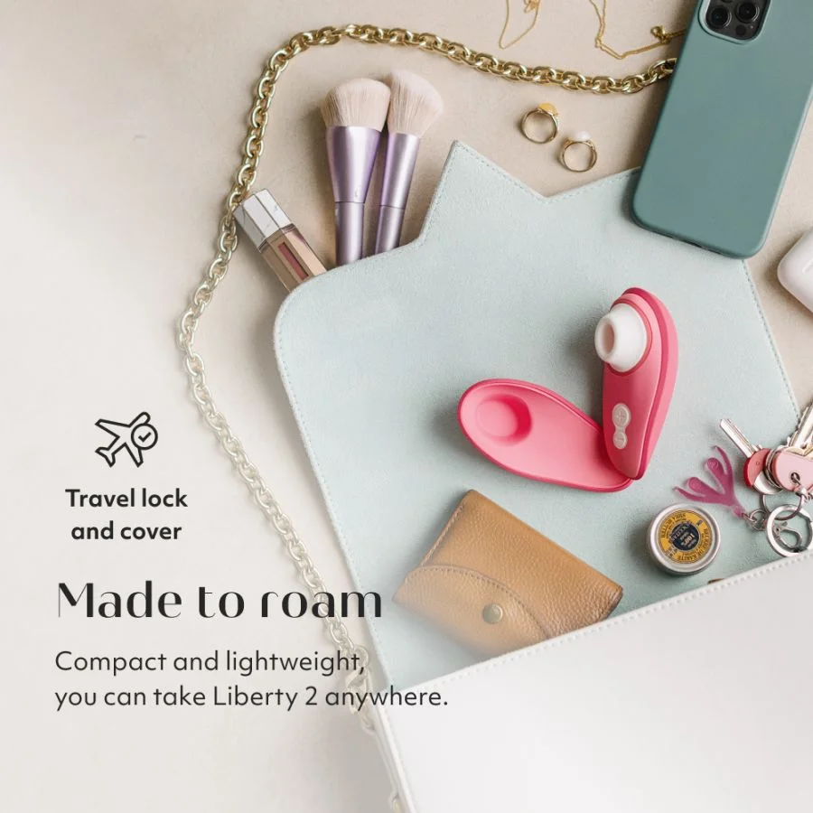 Stimulateur clitoridien à ondes pulsées pour les voyages WOMANIZER "Liberty 2" - Vibrant Rose