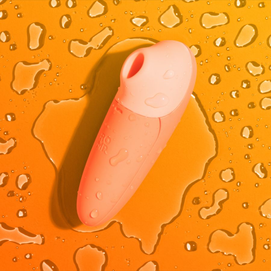 Stimulateur clitoridien ROMP by WOMANIZER "Switch X" - Orange